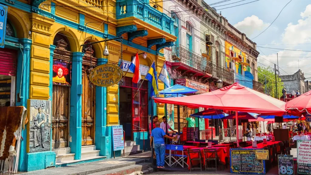 Colorful facades and outdoor cafes on Caminito street in La Boca neighborhood