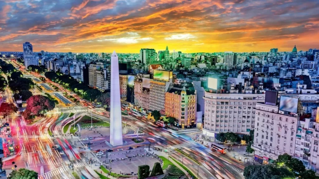 Panoramic view of the Obelisk and Avenida 9 de Julio in Buenos Aires during a colorful sunset